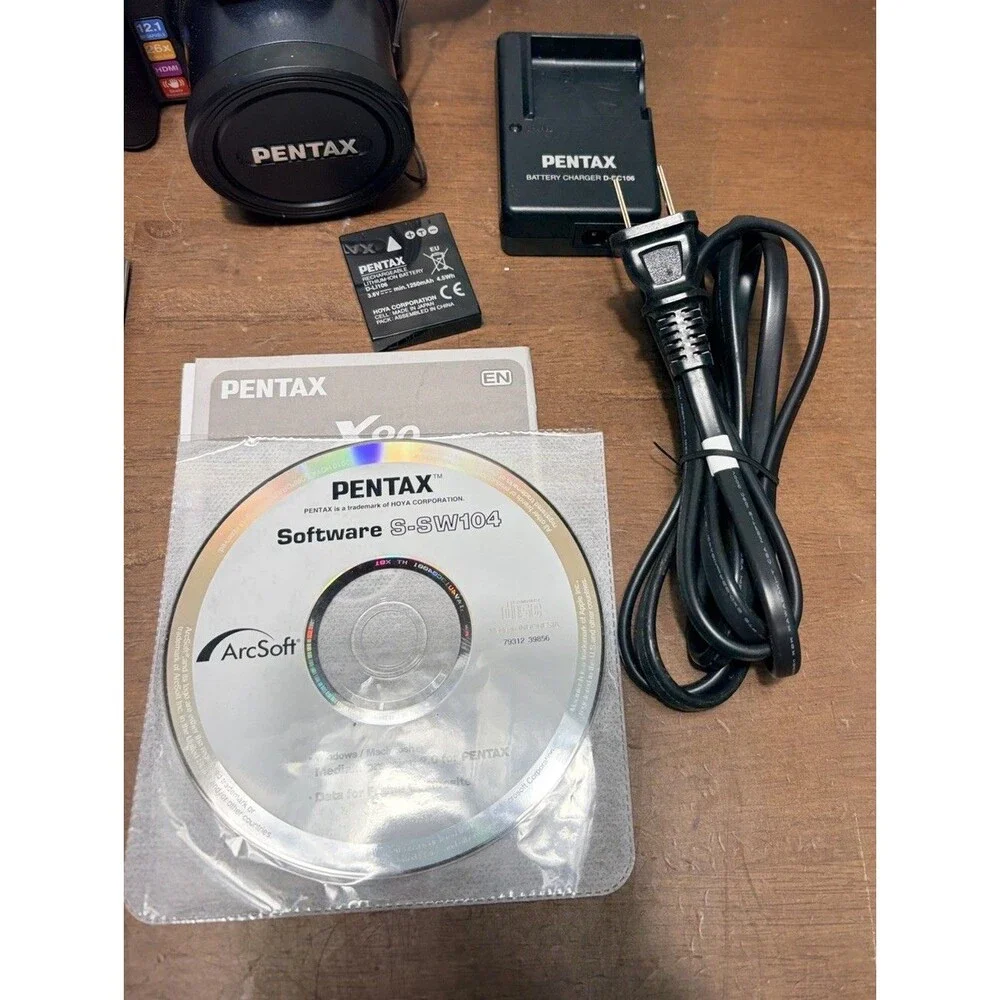 Pentax X90 12.1MP Digital Bridging Camera w/manual, Battery, Charger & Strap